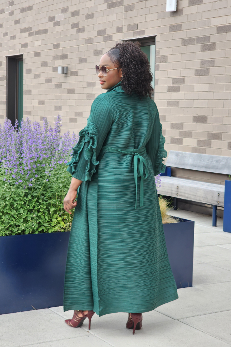 green dress first lady Melania Trump | Melania Trump's strapless emerald gown stole the show at last night's White House state dinner! The First Lady stunned in a shimmering