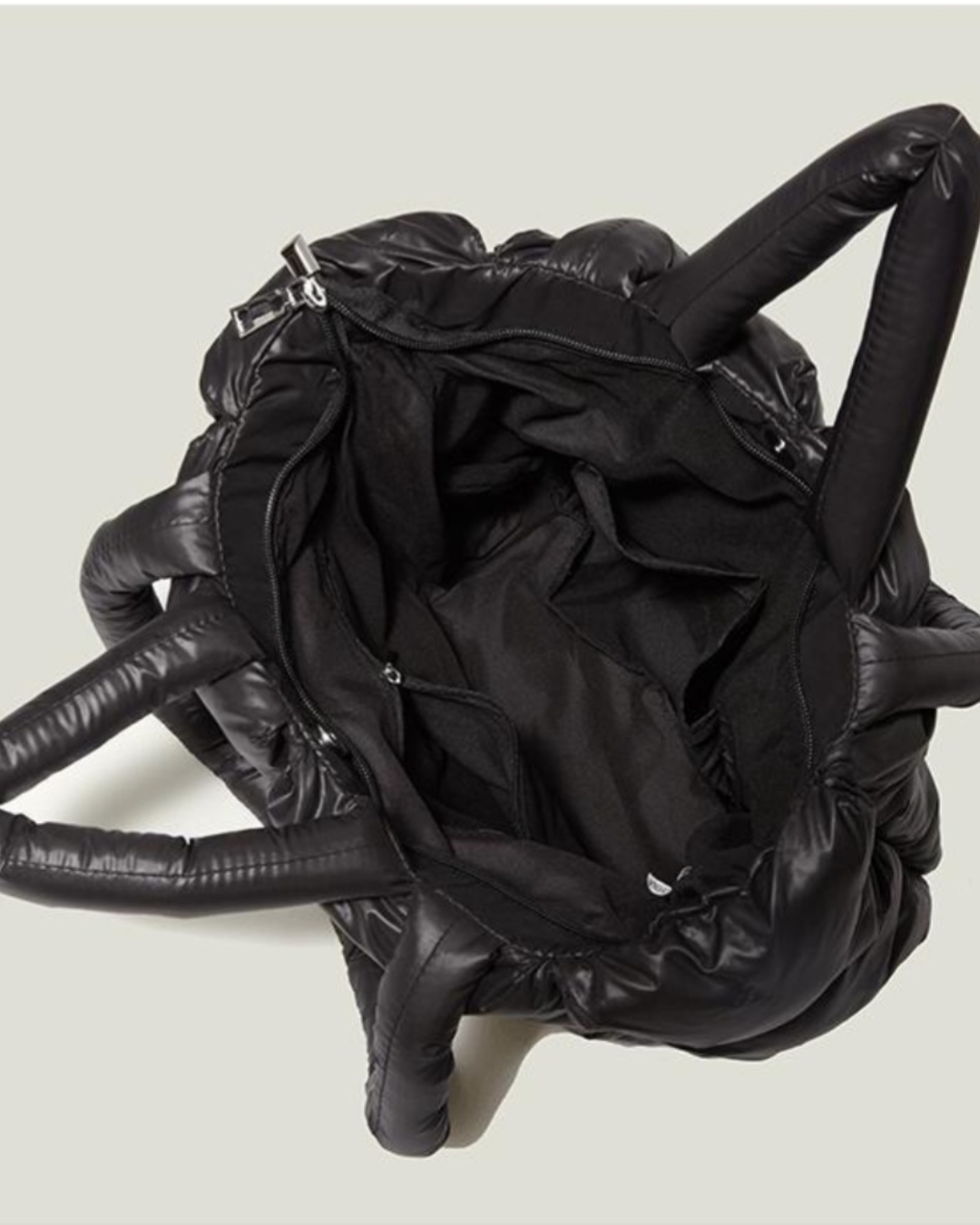 PUFFY BLACK BAG